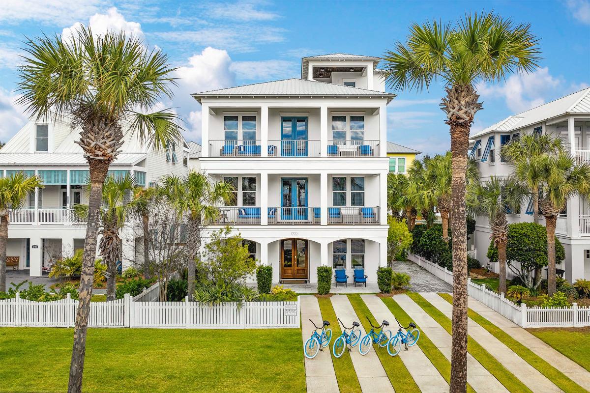 Once Upon A Tide four-story vacation home exterior with balconies and private pool in Frangista Beach