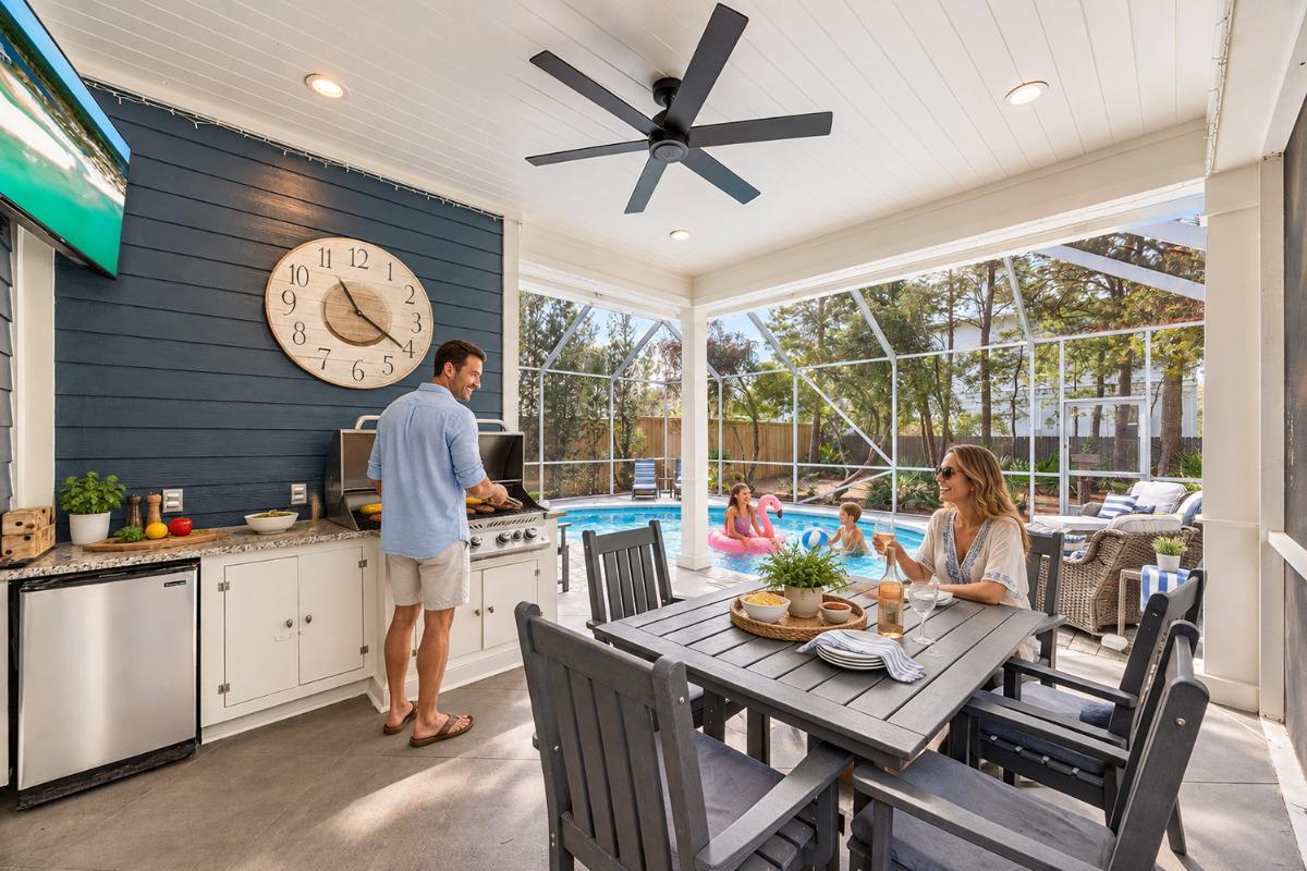 All Laid Back vacation home in Seagrove Beach with screened private pool, outdoor kitchen, and family enjoying the patio.