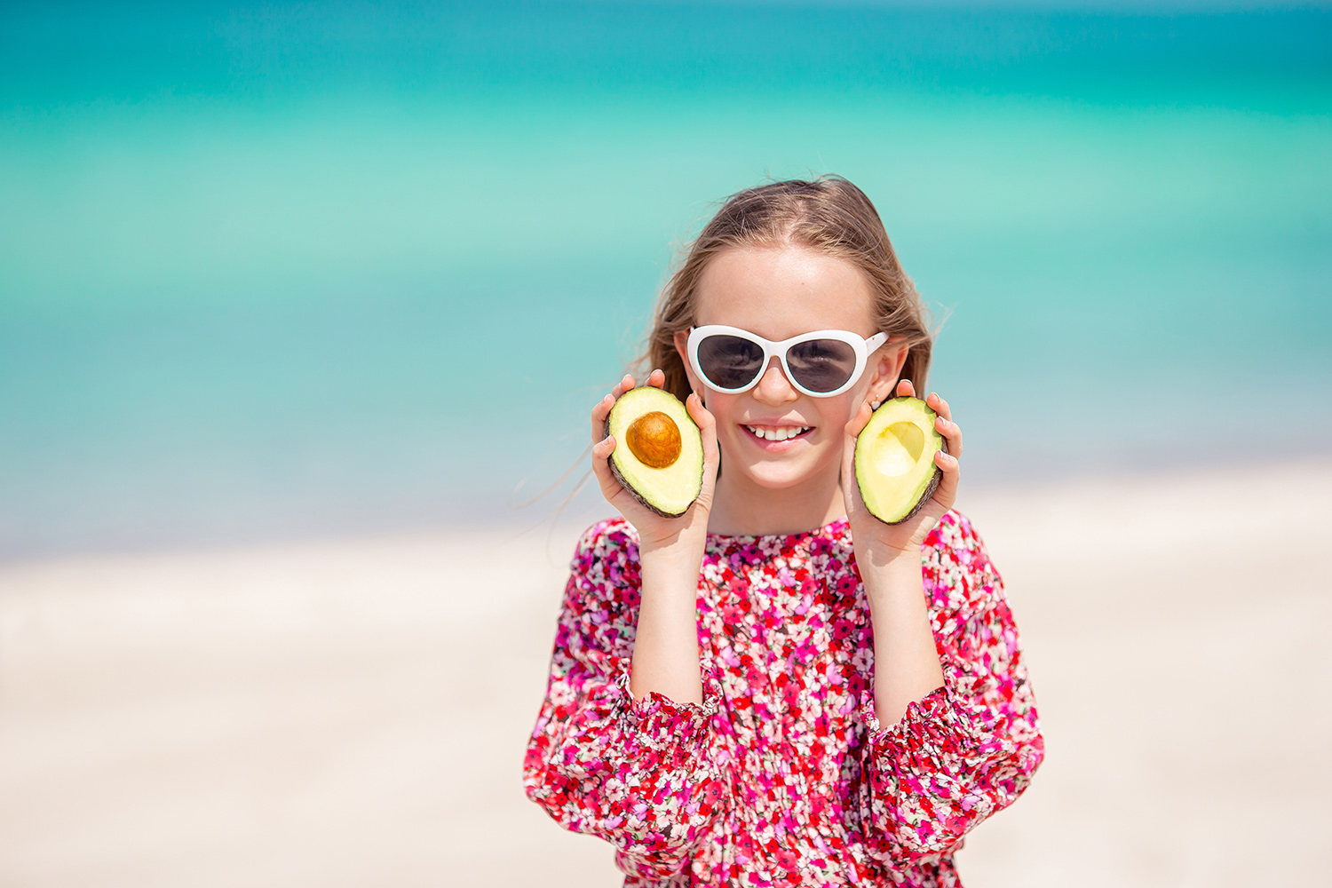 Girl on Beach with Vegetable